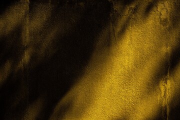 Lightbeam and Shadow on Surface of Old Grunge Fortuna Gold Color Wall Background.