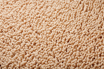 The structure of beige wool fibers in full screen as a background.