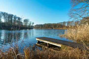 Wooden landingstage at Huwenowsee lake in Meseberg