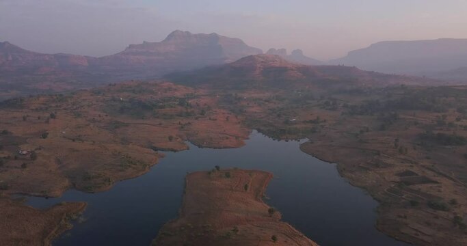 Vaitarna Dam Reservoir, Calm Lake In Talegaon Trimbak, Maharashtra, India. aerial drone