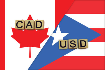 Canada and Puerto Rico currencies codes on national flags background
