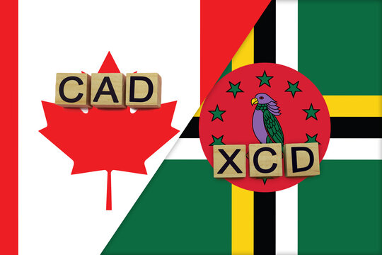 Canada and Dominica currencies codes on national flags background