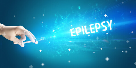 Syringe, medical injection in hand with EPILEPSY inscription, medical antidote concept