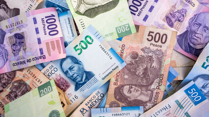 Fototapeta na wymiar background of different mexican bills