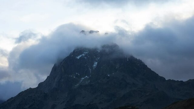 Time - lapse of Pic du Midi d'Ossau, Lac d' Ayous. Stunning nature landscape. Cloud's timelapse.