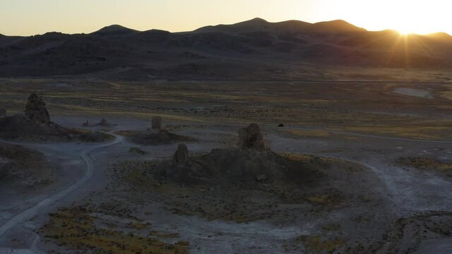 Flying over amazing Trona Pinnacles at sunset. Drone.
