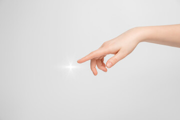 Women's hand shows a finger to the side.