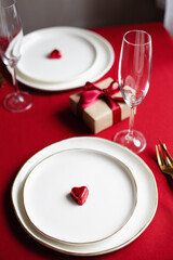 Valentine table setting with gift box.