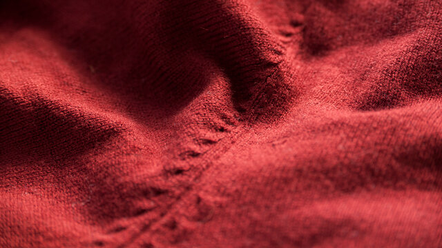 Costura de jersey rojo