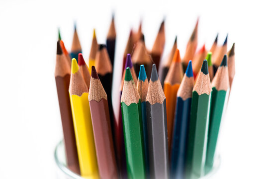 Drawing tools color pencils in glass beaker