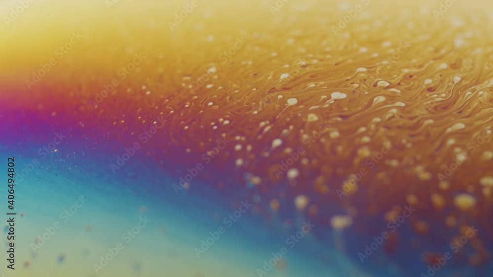 Poster slow-motion background of an experiment with soap lit by a soft light source. mesmerizing shot usefu