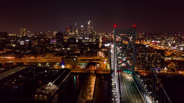 Aerial Timelapse Cityscape over Ben Franklin Bridge Philadelphia at Night