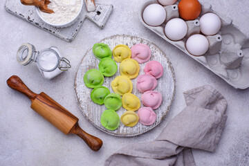 Multi colored dumplings stuffed with meat