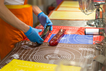 The confectioner is preparing a multicolored caramel.