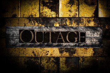Outage text on vintage grunge textured copper and gold background