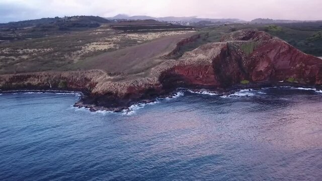 Aerial View Of Salt Bond Beach Park By Calm Blue Sea In Kauai, Hawaii.