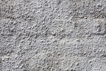 Uneven texture of white concrete brick wall