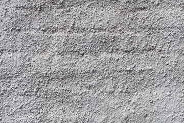 Uneven texture of white concrete brick wall