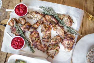 Cooked meat with rosemary and raspberry sauce