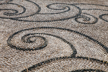 Pebble path with beautiful mosaic