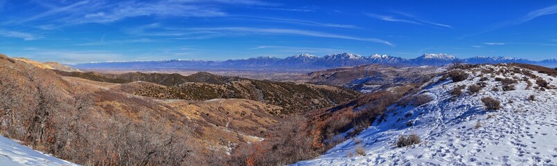 Naklejka na ściany i meble Winter Landscape panorama Oquirrh and Wasatch mountain views from Yellow Fork Canyon County Park Rose Canyon rim hiking trail by Rio Tinto Bingham Copper Mine, Utah. United States.