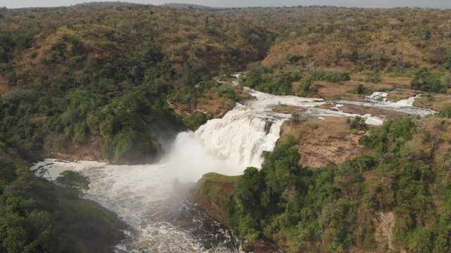 Aerial drone shot of a National Park waterfall in Africa. 
Murchison Falls National Park Uganda.