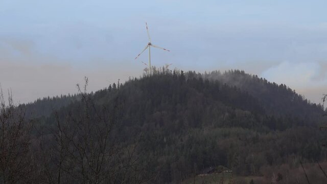 Sustainable wind turbines produce green energy at black forest