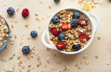 Easy morning breakfast with granola.Muesli from oatmeal, berries view from above