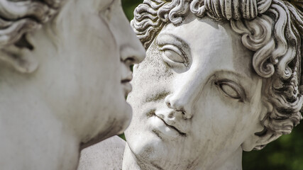 Old statue of beautiful Nymphs in love at Rosenstein city park in Stuttgart, Germany, closeup,...