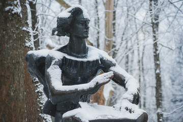 TRUSKAVETS, UKRAINE - JANUARY 15, 2021: sculpture of a cymbalist in Central Park