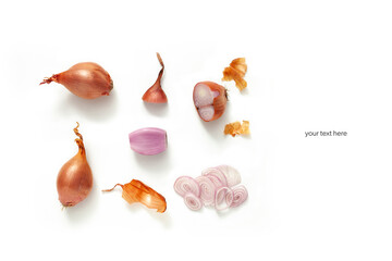 whole and cut shallot on white background. Top view layout