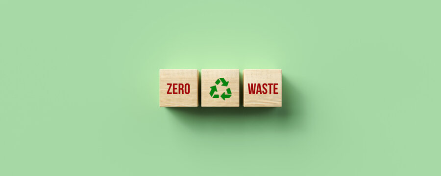 cubes with message ZERO WASTE on green background