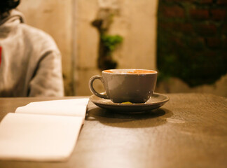empty cup of cappucino at cafe