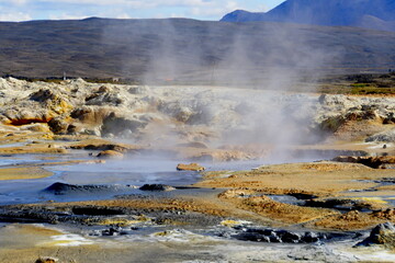 The smoking ground and boiling mud pots at Namafjall Hverir geothermal area near Lake Myvatn, Iceland