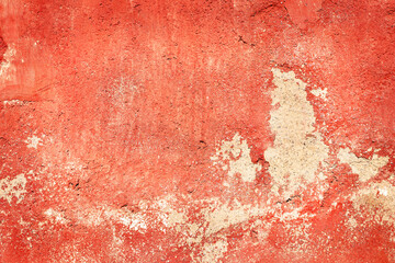 Fondo de muro rojo con desconchones como pared antigua