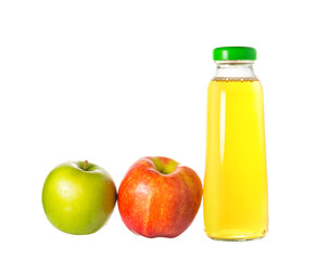 glass bottle with apple juice and two red and green apples. harvest concept, healthy food and healthy lifestyle.