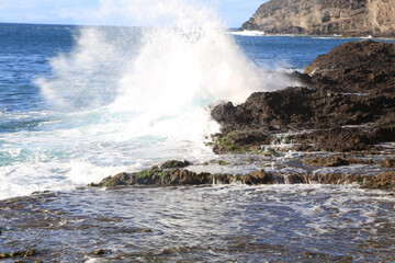 waves crashing on rocks