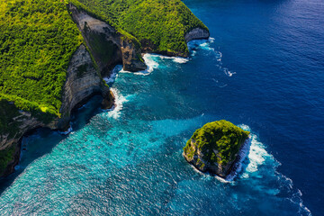 Waves and rocks as a background from top view. Blue water background from top view. Summer seascape from air. Bali island, Indonesia. Travel and vacation