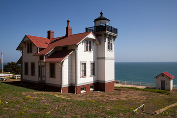 Fototapeta na wymiar Lighthouse on the central coast of California. San Luis Lighthouse, Port San Luis, Avila Beach looking toward ocean