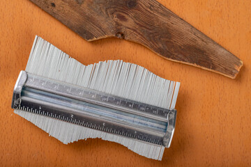 A template for transferring shapes of a piece of wood. Copying complex shapes.