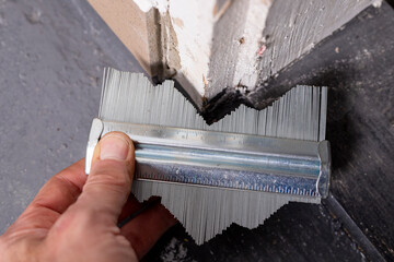 A template for transferring shapes at the door sill. Copying complex shapes.