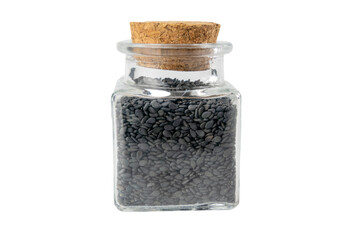 Black Sesame seeds in a glass jar isolated on white background. Spices and food ingredients.