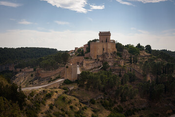 Landscape with the fortified city of Alarcon with its watchtowers and the castle on top of the hill...