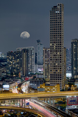 Fototapeta premium Bangkok Thailand cityscape night with big moon