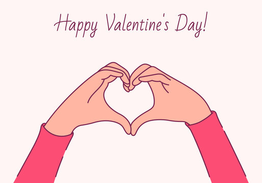 Happy Valentines day, love concept. Female hands in the form of heart 