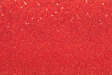 Blurred red glitter and bokeh background. Abstract texture background.