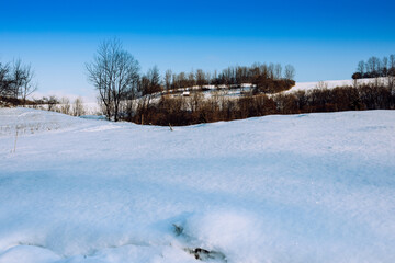 Snow covered landscape on a sunny day.Winter image.