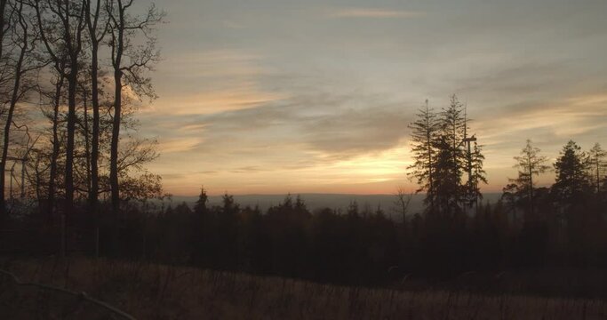 Time Lapse of a beautiful sunset in Hesse with a forrest in the foreground