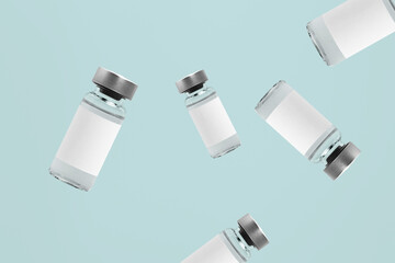 Falling injection vial glass bottles with white labels