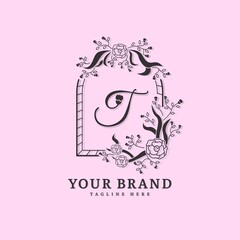 Initial letter T with natural logo vector concept element, letter T logo with floral ornament. Minimalist design logo.